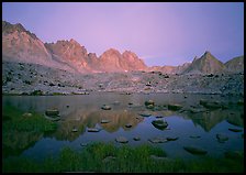 Mt Agasiz, Mt Thunderbolt, and Isoceles Peak reflected in a lake in Dusy Basin, sunset. Kings Canyon National Park, California, USA. (color)