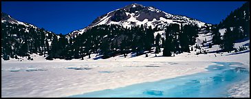 Turquoise color in ice melt below Lassen Peak. Lassen Volcanic National Park, California, USA.