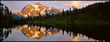 Mount Shuksan reflected in lake at sunset. North Cascades National Park (Panoramic color)