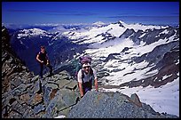 Mountaineers on ridge below  summit of Sahale Peak, North Cascades National Park. Washington, USA. (color)