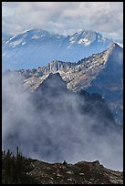 Peaks partly obscured by clouds, North Cascades National Park.  ( color)