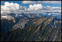 Mountains and afternoon cumulus clouds, North Cascades National Park. Washington, USA.