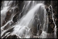 Water falling over volcanic rock, North Cascades National Park. Washington, USA.