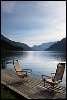 Two chairs on the shore of Lake Chelan, Stehekin, North Cascades National Park Service Complex. Washington, USA.