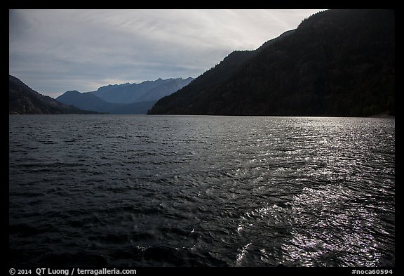 Sun shimmering in Lake Chelan waters, North Cascades National Park Service Complex.  (color)