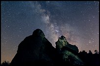 Night sky with Milky Way above High Peaks rocks. Pinnacles National Park, California, USA. (color)