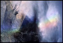 Rainbow, water, and rock at  base of Upper Yosemite Falls. Yosemite National Park, California, USA. (color)