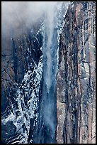 Ribbon Falls and snowy cliff. Yosemite National Park, California, USA.