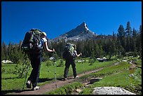 Women backpacking on John Muir Trail below Tressider Peak. Yosemite National Park, California, USA. (color)