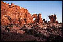 Cove of Arches, Double Arch, and Parade of Elephants at dusk. Arches National Park, Utah, USA. (color)