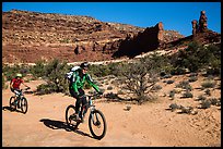 Mountain bikers in Teapot Canyon, Maze District. Canyonlands National Park ( color)