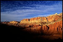Layers of rock on  West face of Waterpocket Fold at sunset. Capitol Reef National Park, Utah, USA.