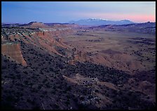Cliffs, basin, and snowy mountains at dusk, Upper Desert, dusk. Capitol Reef National Park ( color)