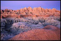 Cracked mud and erosion formations, Cedar Pass, dawn. Badlands National Park, South Dakota, USA. (color)