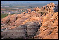 Eroded sedimentary rock layers at sunrise. Badlands National Park, South Dakota, USA. (color)