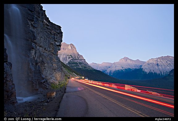Roadside waterfall and light trail, Going-to-the-Sun road. Glacier National Park, Montana, USA.