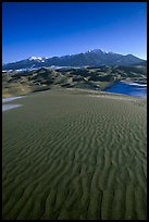 Sand ripples and Sangre de Christo mountains in winter. Great Sand Dunes National Park and Preserve, Colorado, USA.