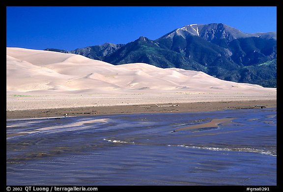 Mendonca creek, dunes and Sangre de Christo mountains. Great Sand Dunes National Park and Preserve, Colorado, USA.