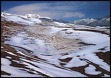 Melting snow on the dunes. Great Sand Dunes National Park and Preserve, Colorado, USA.