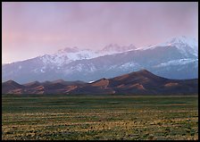 Flats, sand dunes, and snowy Sangre de Christo mountains. Great Sand Dunes National Park and Preserve ( color)