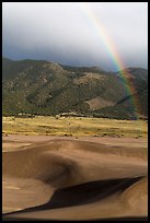 Rainbow over dune field. Great Sand Dunes National Park, Colorado, USA. (color)