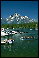Boaters at Colter Bay marina with Mt Moran in the background, morning. Grand Teton National Park, Wyoming, USA. (color)