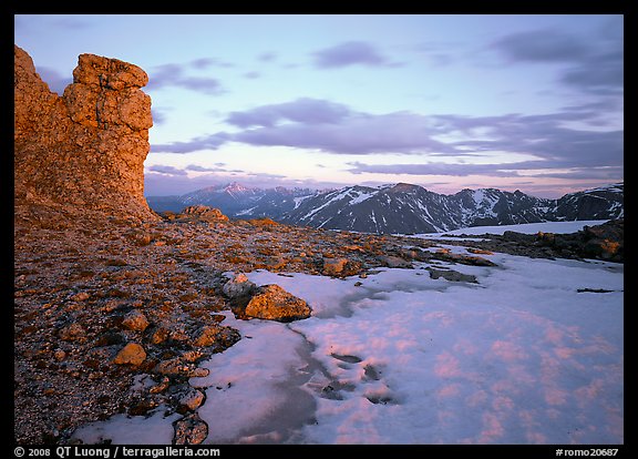 Rock tower and neve at sunset, Toll Memorial. Rocky Mountain National Park, Colorado, USA.