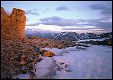 Rock tower and neve at sunset, Toll Memorial. Rocky Mountain National Park, Colorado, USA.