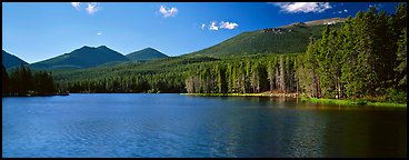 Clear lake with forested shores. Rocky Mountain National Park (Panoramic color)