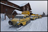 Snow busses in front of Old Faithful Snow Lodge. Yellowstone National Park, Wyoming, USA. (color)