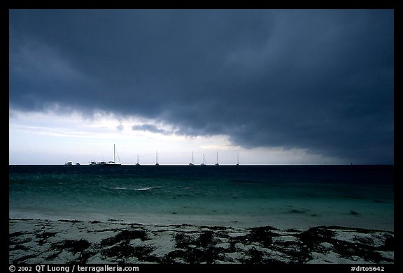 Approaching storm over Yachts at Tortugas anchorage. Dry Tortugas National Park, Florida, USA.