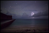 Fort Jefferson and beach at night with cloud electric storm. Dry Tortugas National Park ( color)