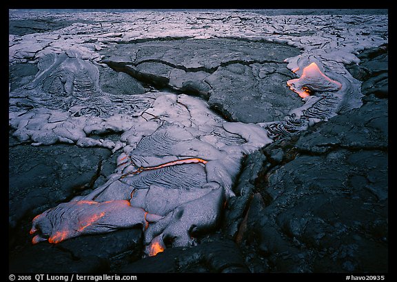 New lava flows over hardened lava. Hawaii Volcanoes National Park (color)