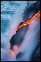 Glowing lava flow reaching the sea. Hawaii Volcanoes National Park, Hawaii, USA. (color)