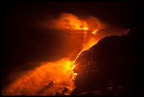 Streams of lava flow into Pacific Ocean. Hawaii Volcanoes National Park, Hawaii, USA. (color)