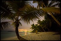 Salomon beach with distant lights at night. Virgin Islands National Park, US Virgin Islands.