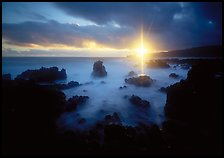 Sun shining brilliantly over primeval seascape, Kenae Peninsula. Maui, Hawaii, USA (color)