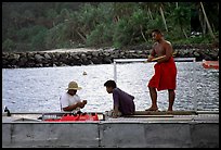 Men on a ferry to Aunuu. Aunuu Island, American Samoa (color)