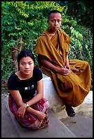 Buddhist novice monk and his sister. Luang Prabang, Laos (color)