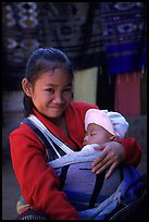 Girl and baby, Ban Xang Hai. Laos (color)