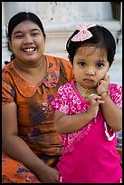 Girl and mother, Shwedagon Pagoda. Yangon, Myanmar
