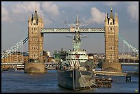HMS Belfast cruiser and Tower Bridge, late afternoon. London, England, United Kingdom (color)