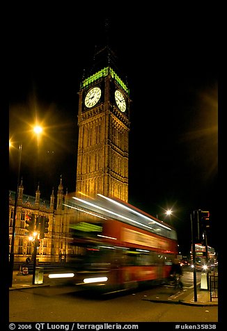 Big Ben and double decker bus in motion at nite. London, England, United Kingdom