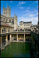 Great Bath Roman building, with Abbey in background. Bath, Somerset, England, United Kingdom (color)