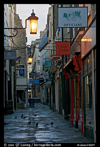 Lamps, pigeons, and narrow street. Bath, Somerset, England, United Kingdom (color)