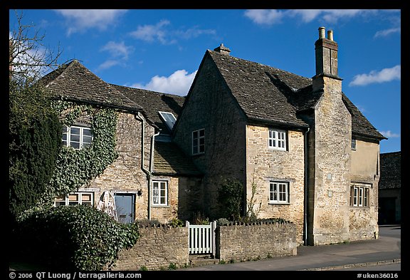 Houses with roofs made from split natural stone tiles, Lacock. Wiltshire, England, United Kingdom
