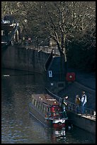 Family stepping out of houseboat onto quay. Bath, Somerset, England, United Kingdom ( color)