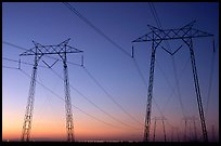 High tension power lines at sunset. California, USA