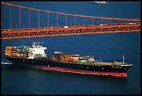 Container ship cruising under the Golden Gate Bridge. San Francisco, California, USA (color)
