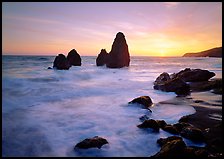 Wave action, seastacks and rocks with sun setting, Rodeo Beach. California, USA ( color)